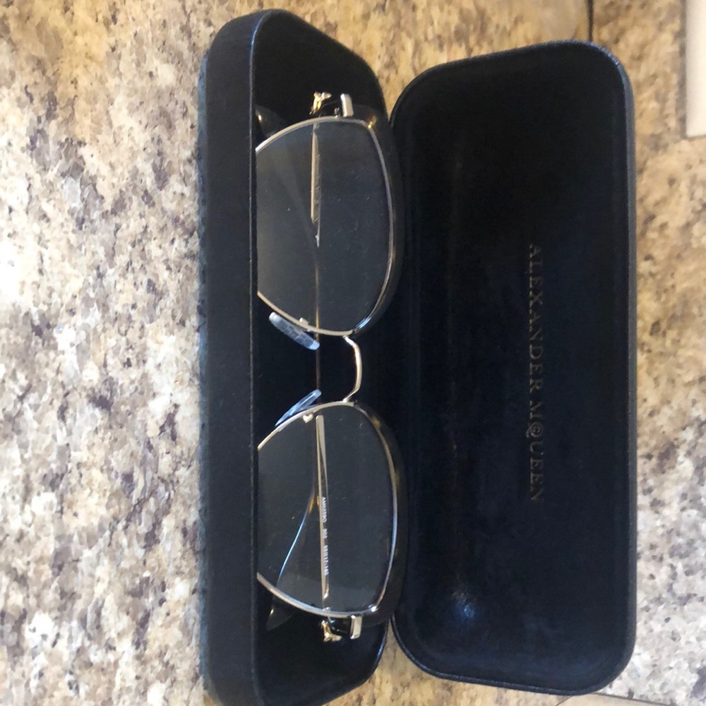 Alexander McQueen Hard case, authenticity card as well as cloth cover.  Cat 👁️.